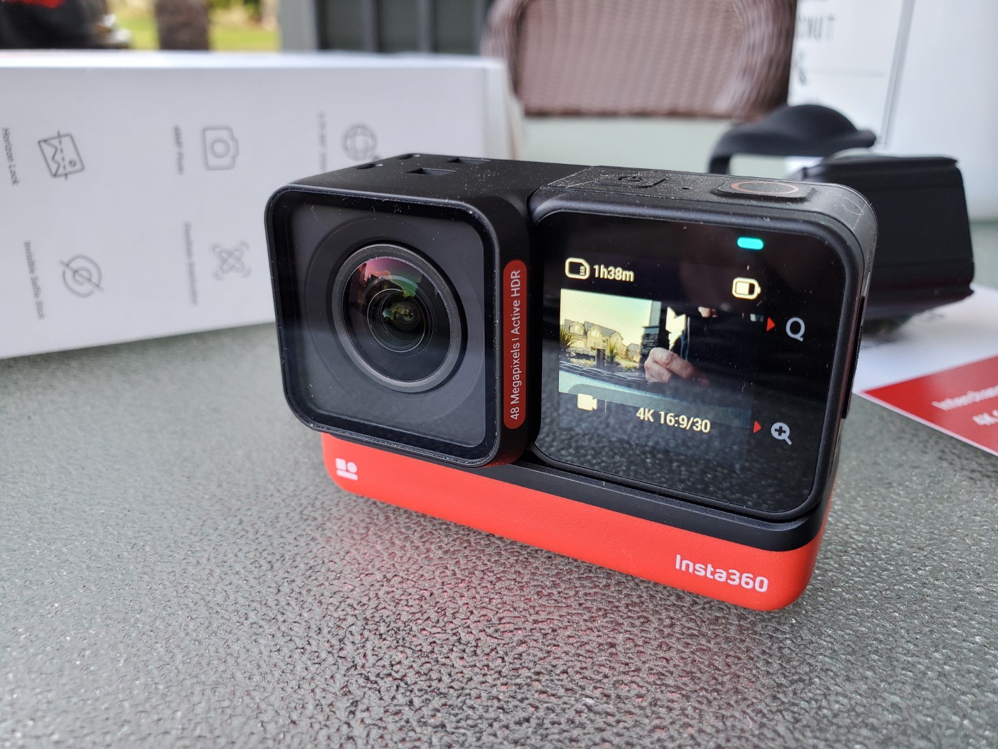 review: ZDNET | action three camera, One lenses Insta360 compelling RS swappable One