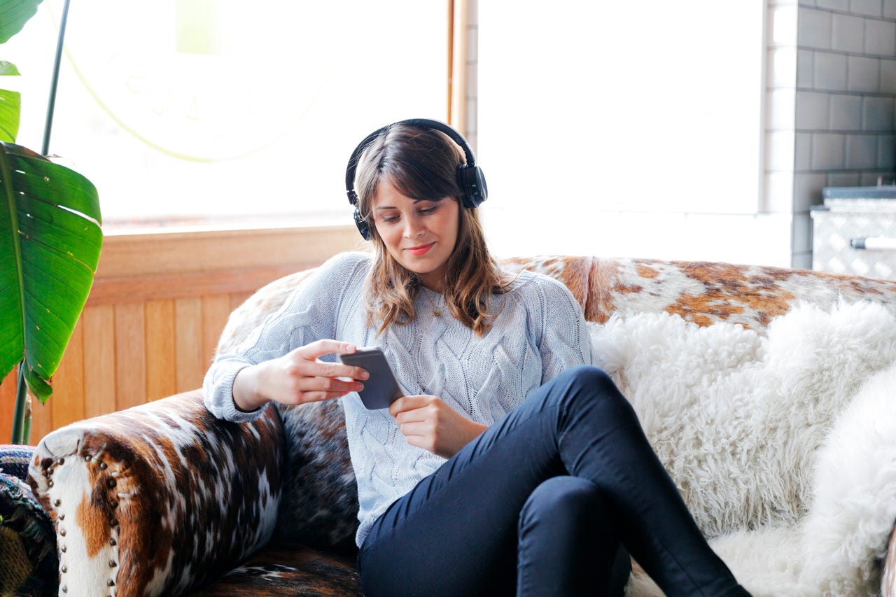 Person listening with headphones
