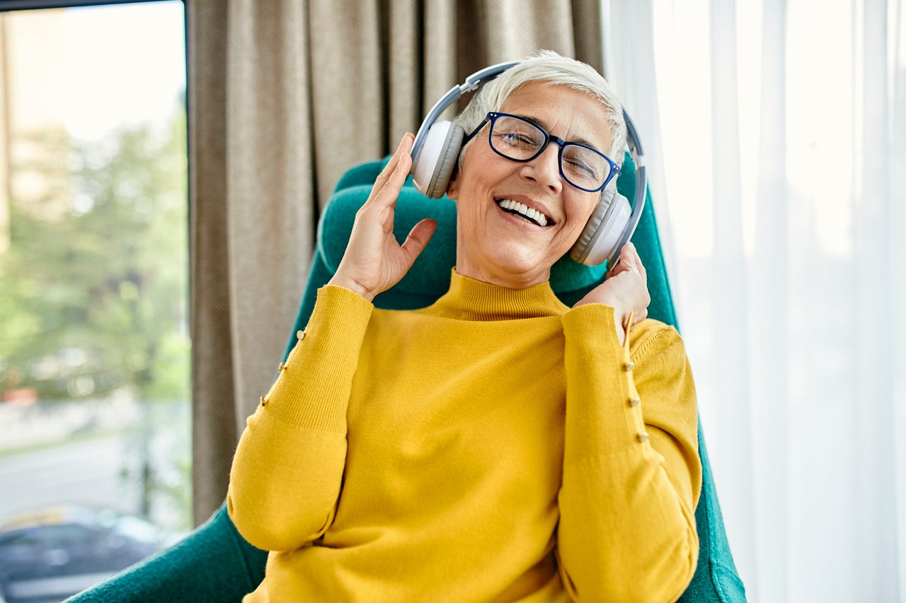 Person with headphones in enjoying music