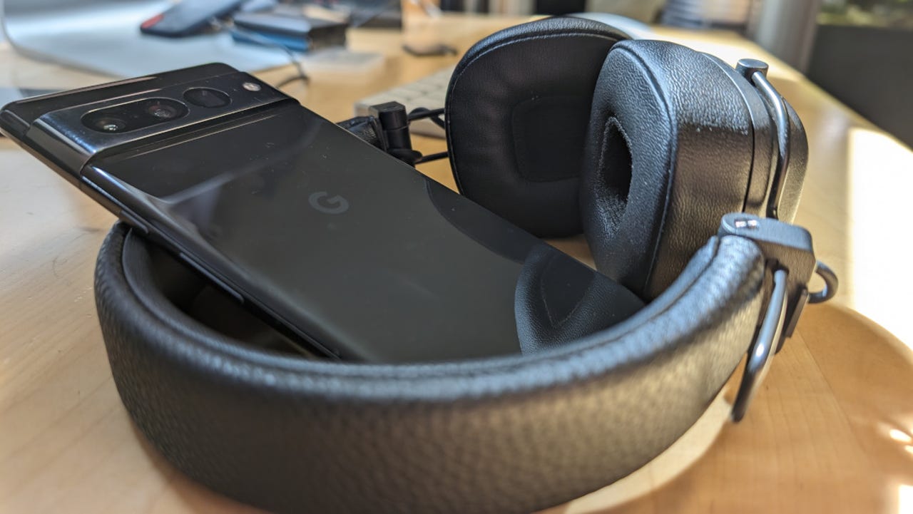 Pixel 7 Pro is in a pair of Marshall headphones.