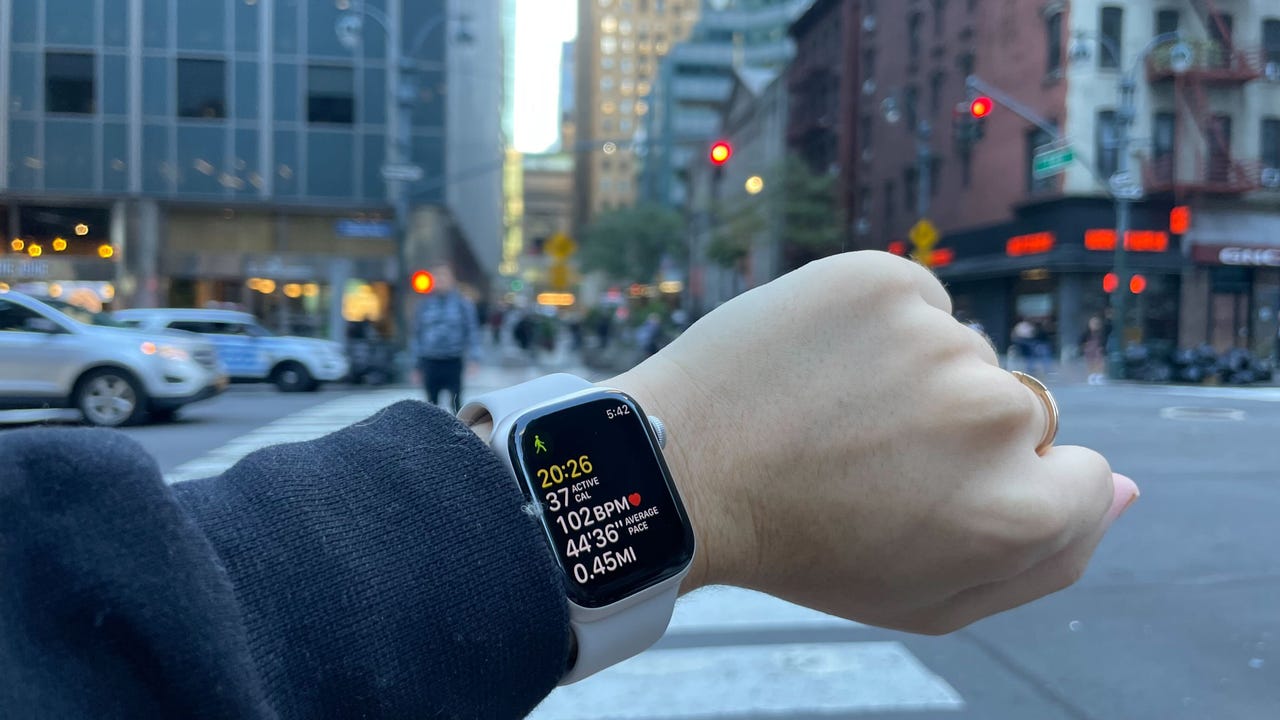 Hand with Apple Watch Series 8 walking stats
