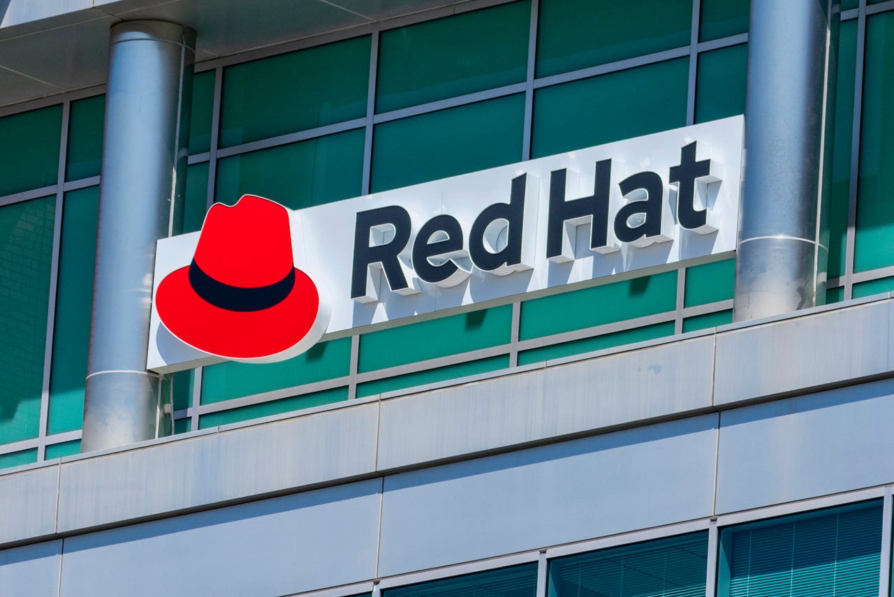 Red Hat logo and sign on open-source software company office