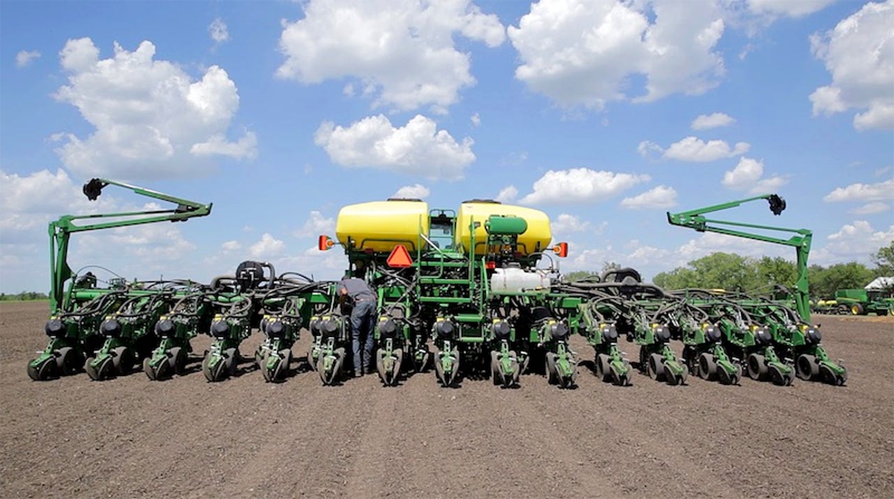 John Deere agreed to give farmers the right to fix their own tractors