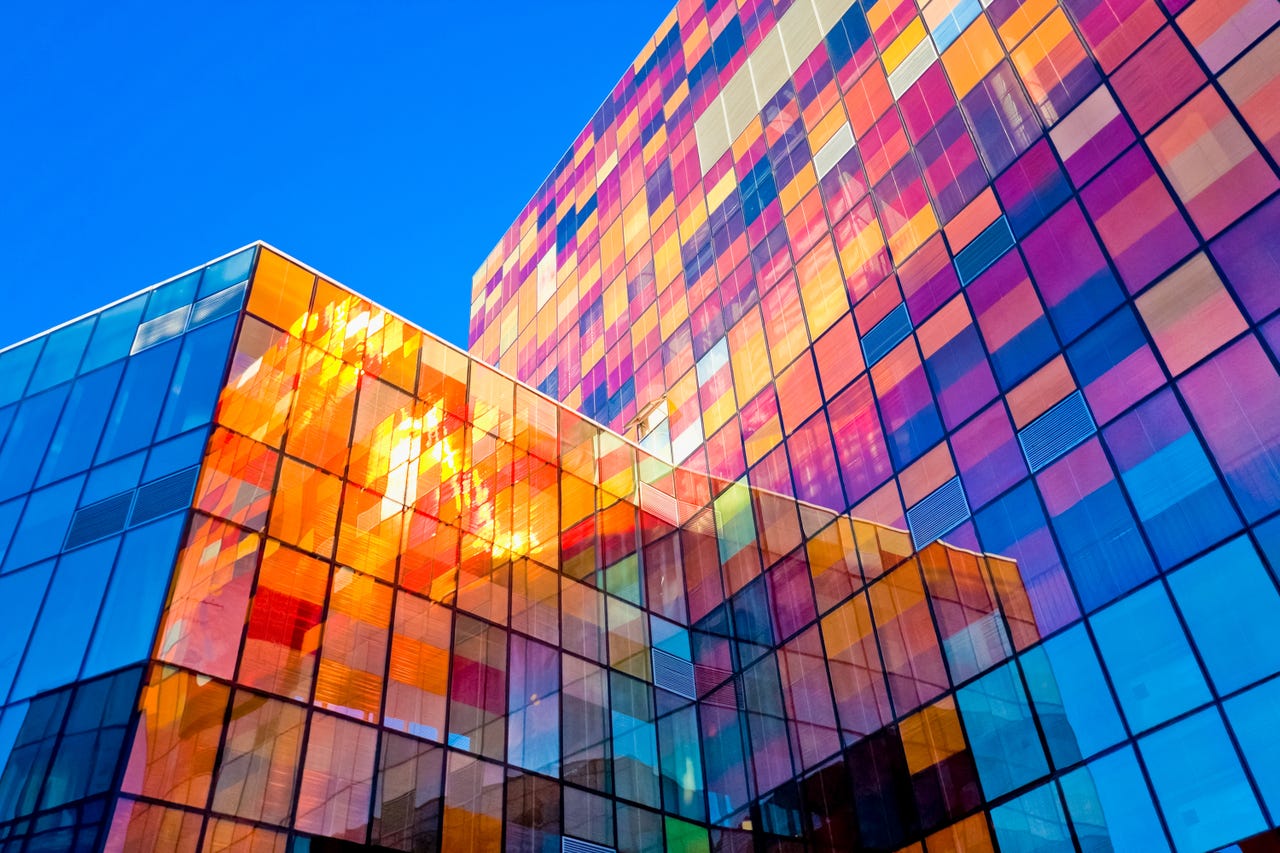 colorful windows against a blue sky
