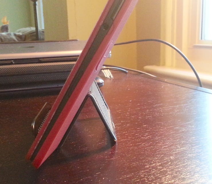 Travel Hack: $10 plastic tablet stand is amazing for reading on