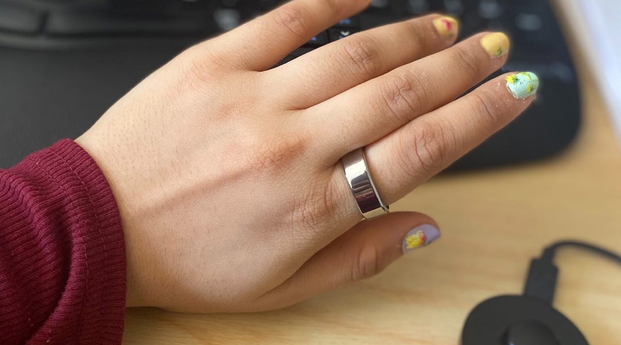 Oura Ring on a hand